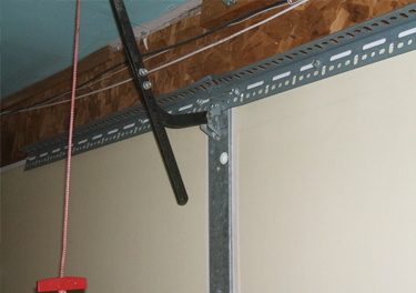 garage door bracket repair in in Shadow Hills
