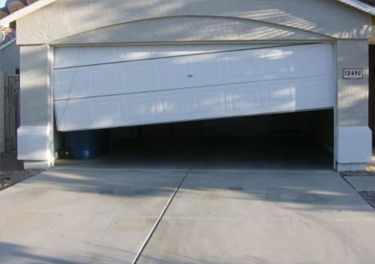 garage door off track repair in in Shadow Hills