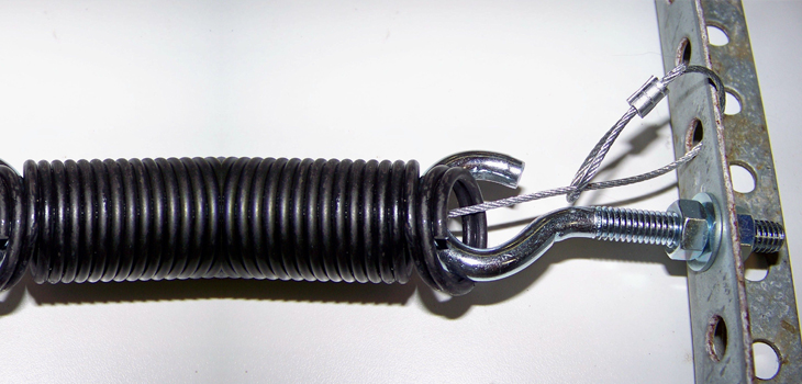 garage door safety spring repair in Shadow Hills